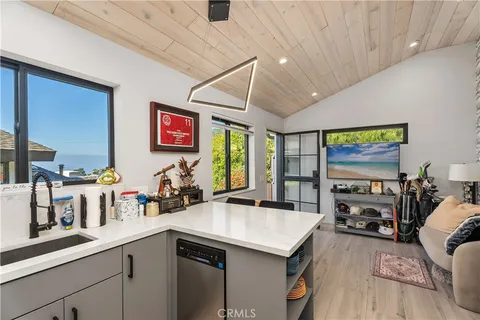 a view of a kitchen area with furniture and window