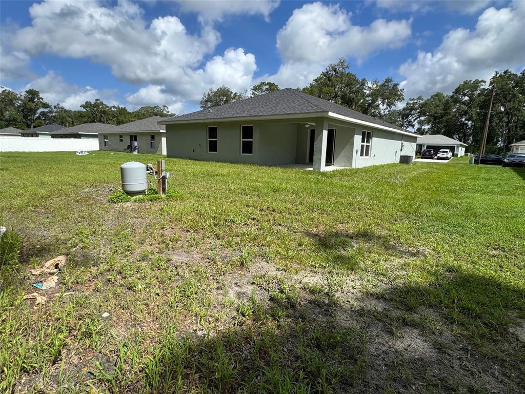 17600 Southwest 113th Place Dunnellon, FL 34432 - Photo 7 of 33 a view of a house with a yard and sitting area