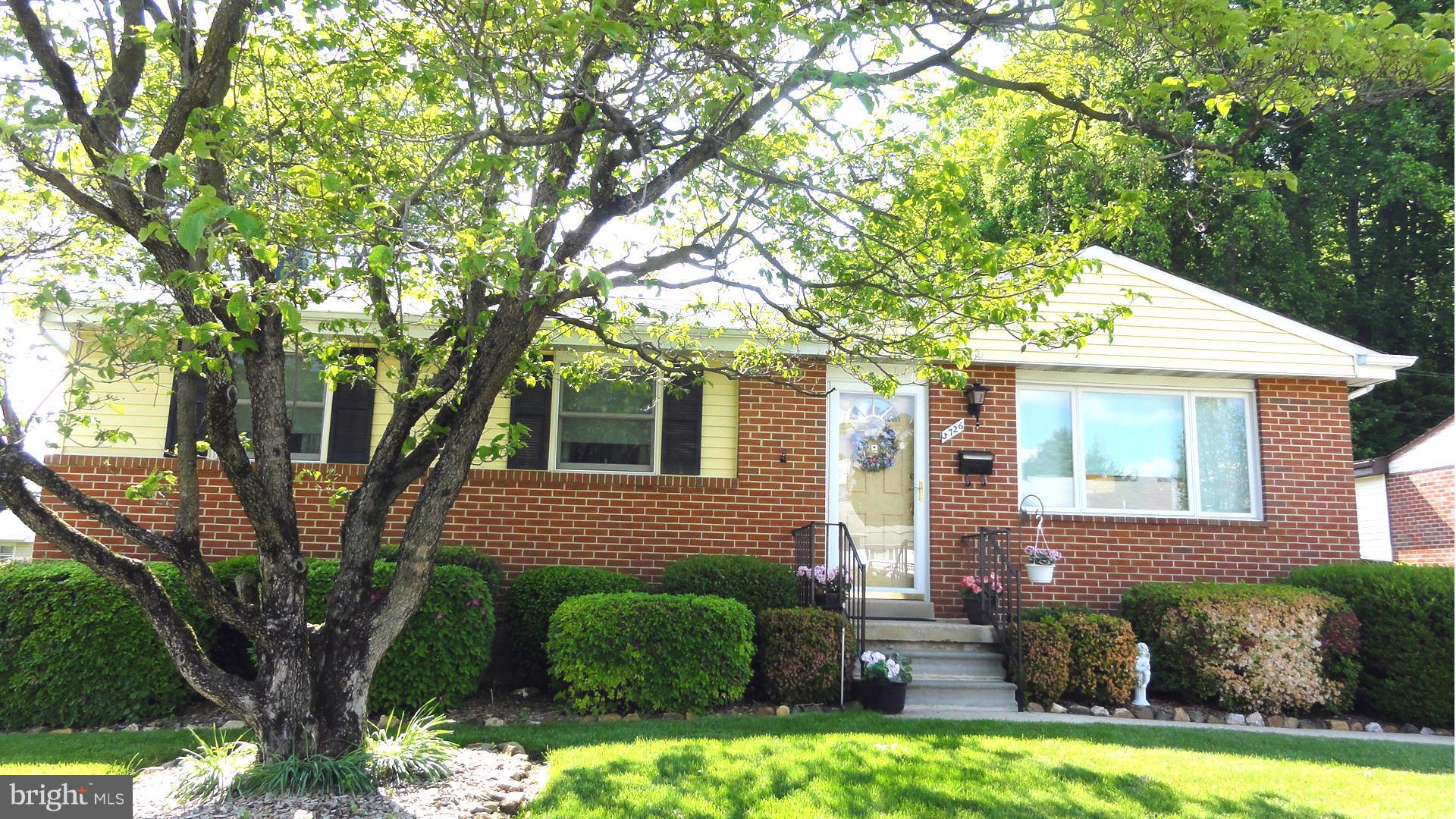 3726 Collier Road Randallstown, MD 21133 - Photo 1 of 20 a front view of a house with garden