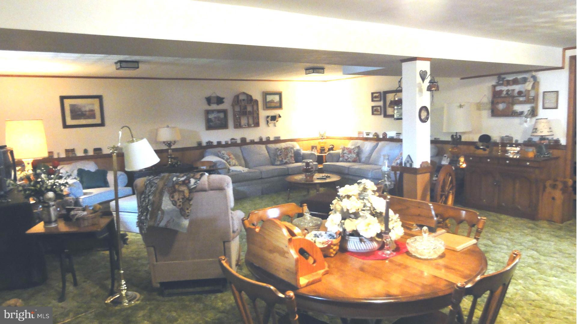 3726 Collier Road Randallstown, MD 21133 - Photo 13 of 20 a view of a dining room with furniture