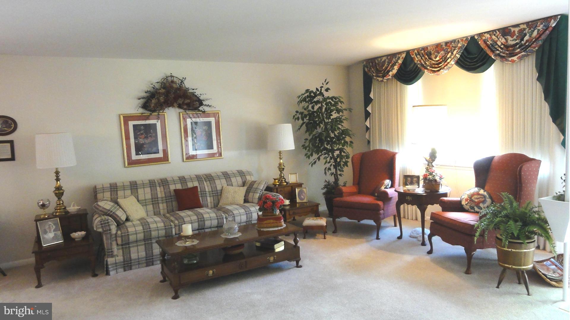 3726 Collier Road Randallstown, MD 21133 - Photo 4 of 20 a living room with furniture and a window