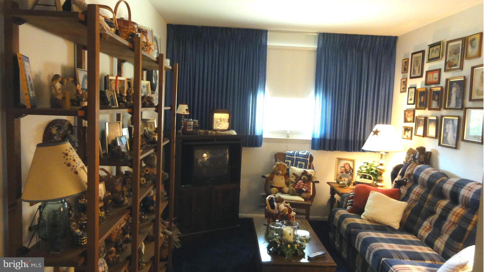 3726 Collier Road Randallstown, MD 21133 - Photo 10 of 20 a living room with furniture and a window