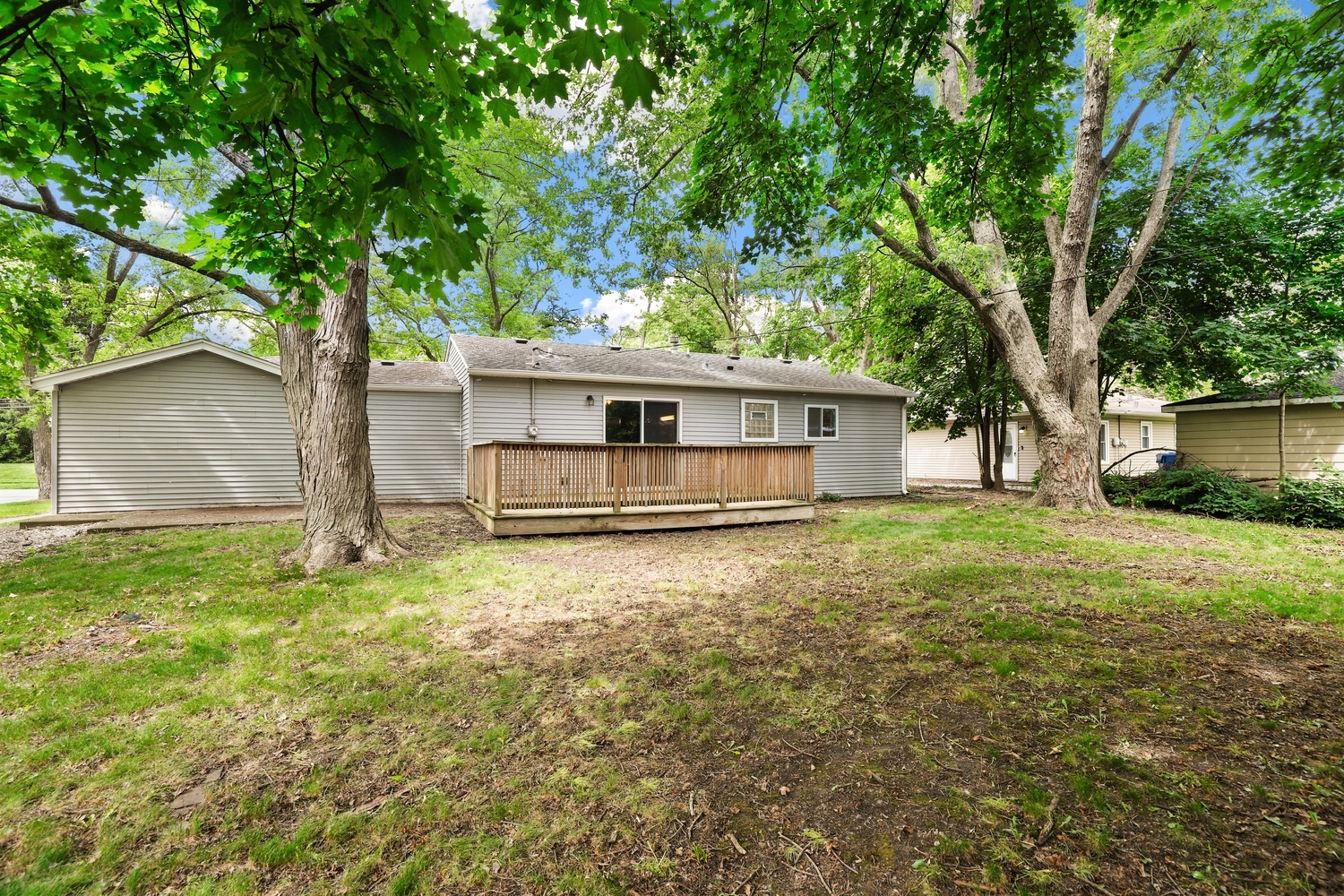 231 West 35th Street Steger, IL 60475 - Photo 16 of 17 a house with trees in the background
