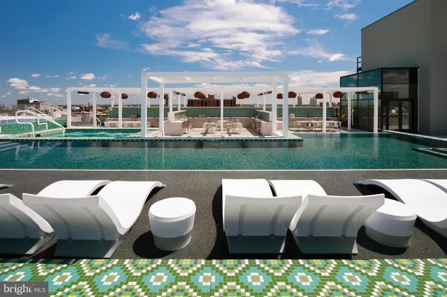 a view of swimming pool outdoor seating yard and outdoor seating