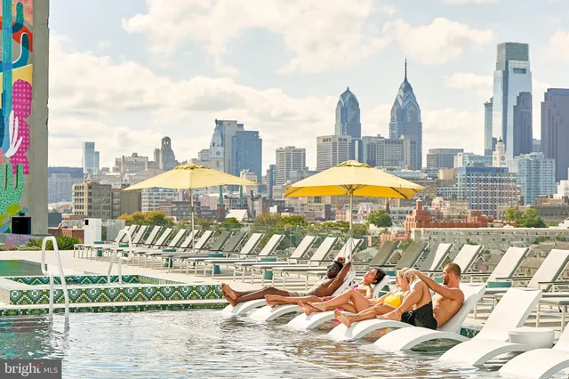 a view of an ocean with a city view