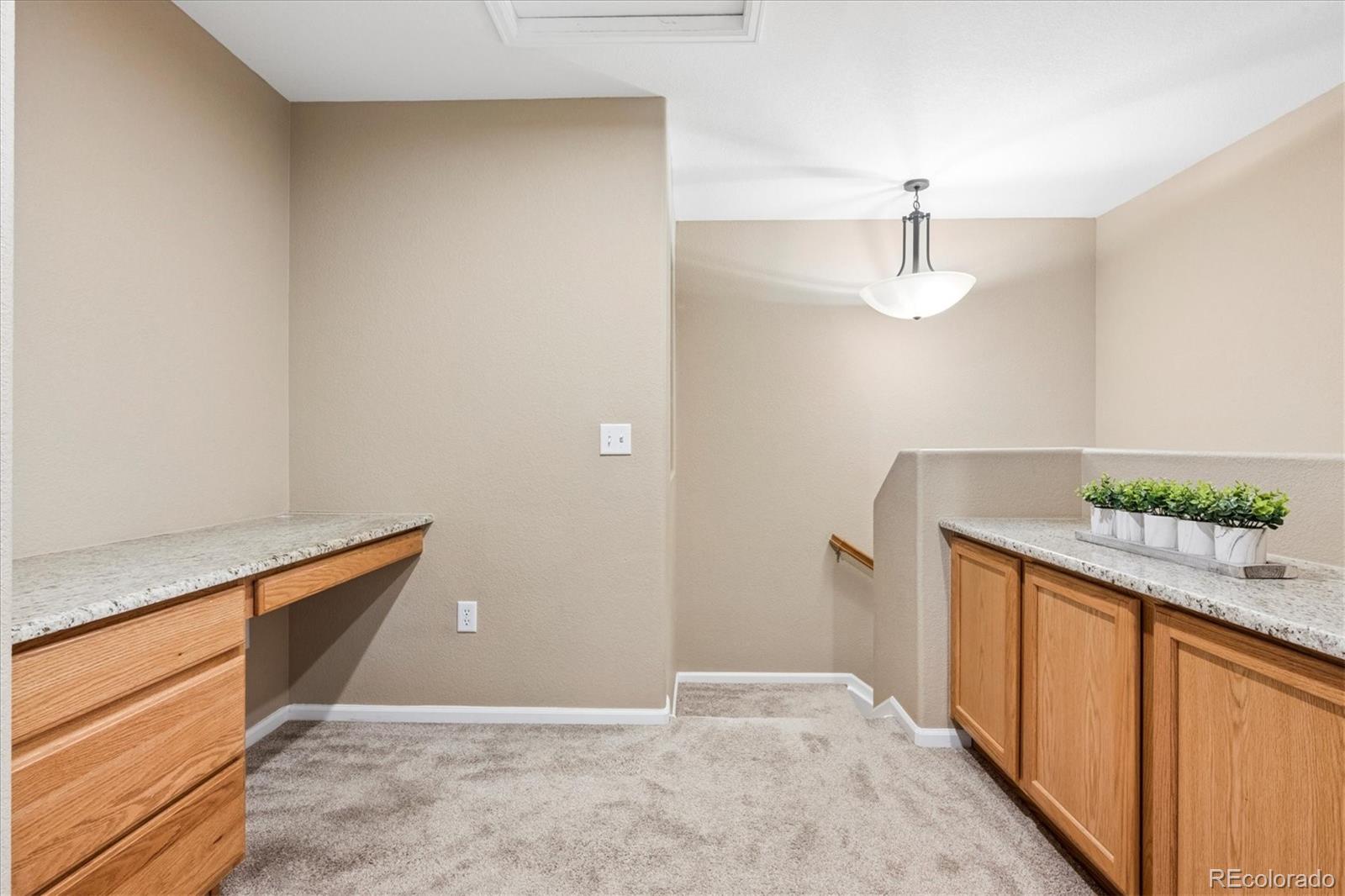 485 Elmhurst Way, Unit C Highlands Ranch, CO 80129 - Photo 29 of 42 a view of cabinets