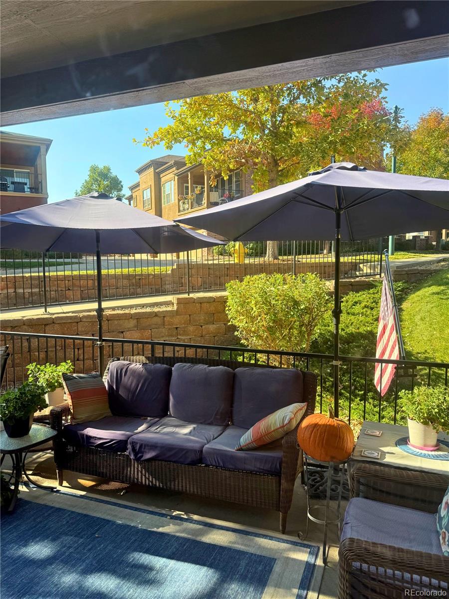 485 Elmhurst Way, Unit C Highlands Ranch, CO 80129 - Photo 40 of 42 a outdoor living room with furniture