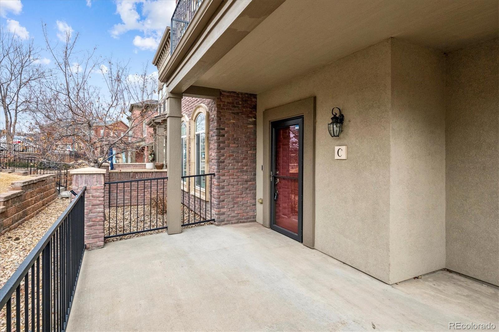 485 Elmhurst Way, Unit C Highlands Ranch, CO 80129 - Photo 4 of 42 a view of entryway with a outdoor space