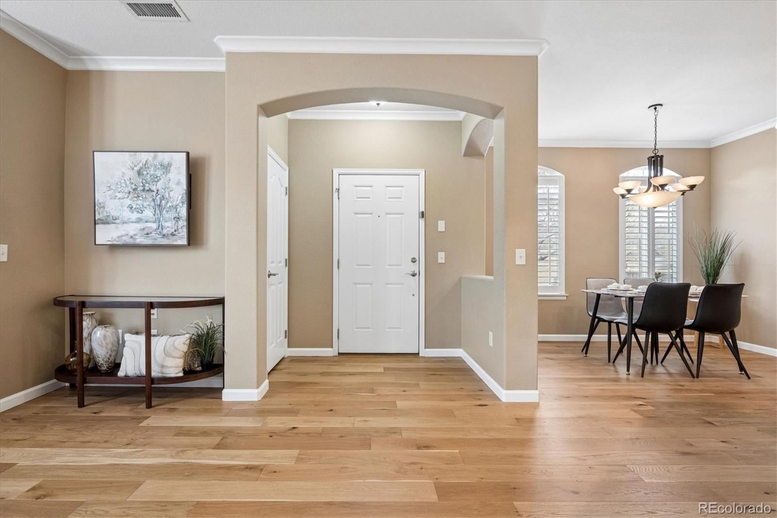 485 Elmhurst Way, Unit C Highlands Ranch, CO 80129 - Photo 6 of 42 a view of a livingroom with furniture and a fireplace