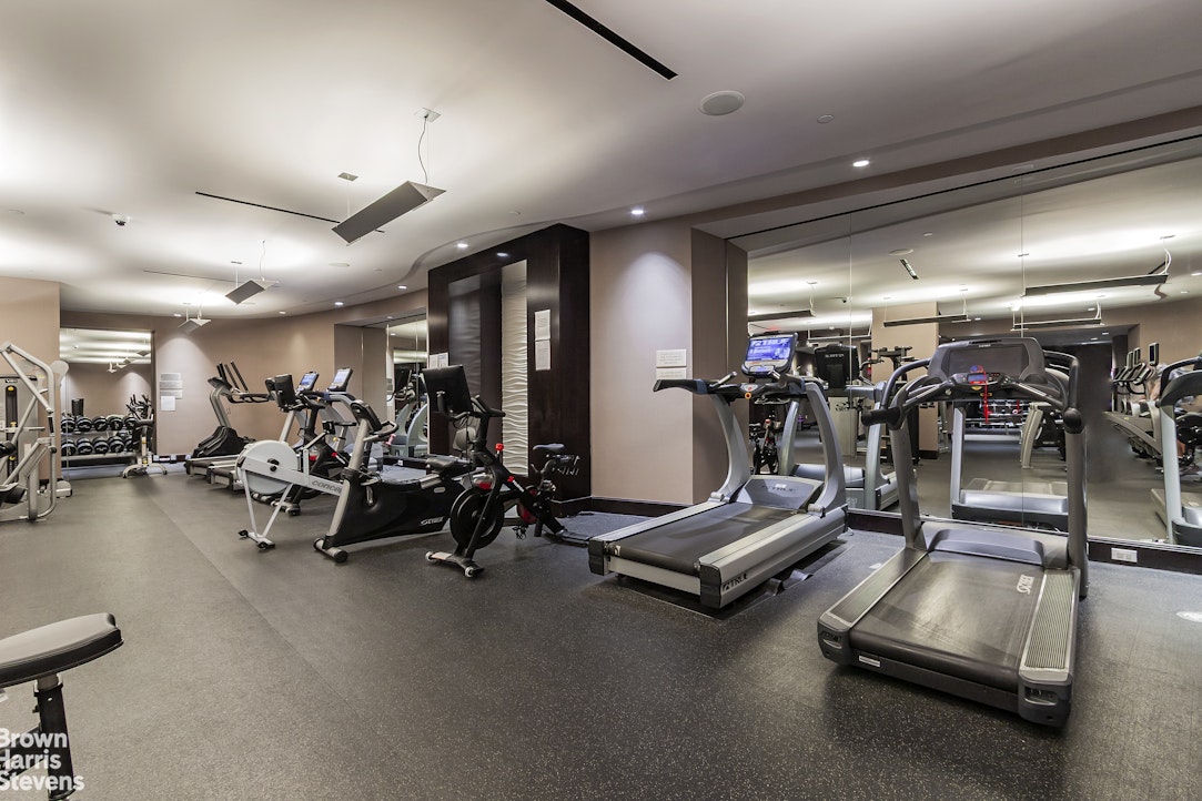 100 Riverside Boulevard, Unit 27A Manhattan, NY 10069 - Photo 9 of 48 a view of a room with gym equipment