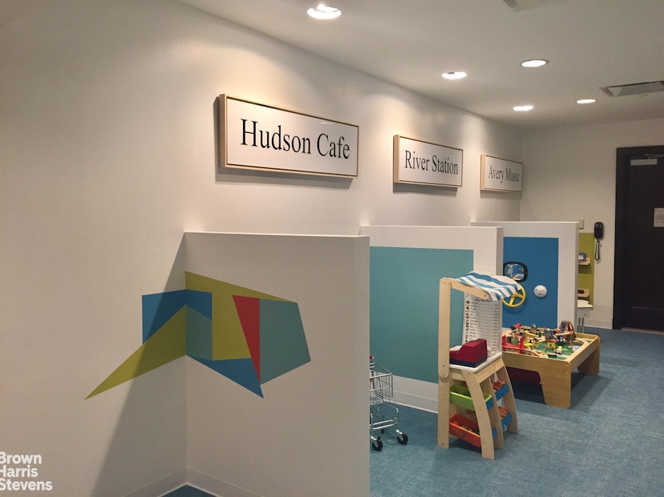 100 Riverside Boulevard, Unit 27A Manhattan, NY 10069 - Photo 13 of 48 a living room with a couch