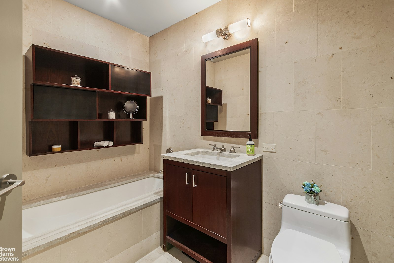 100 Riverside Boulevard, Unit 27A Manhattan, NY 10069 - Photo 30 of 48 a bathroom with a sink toilet and shower