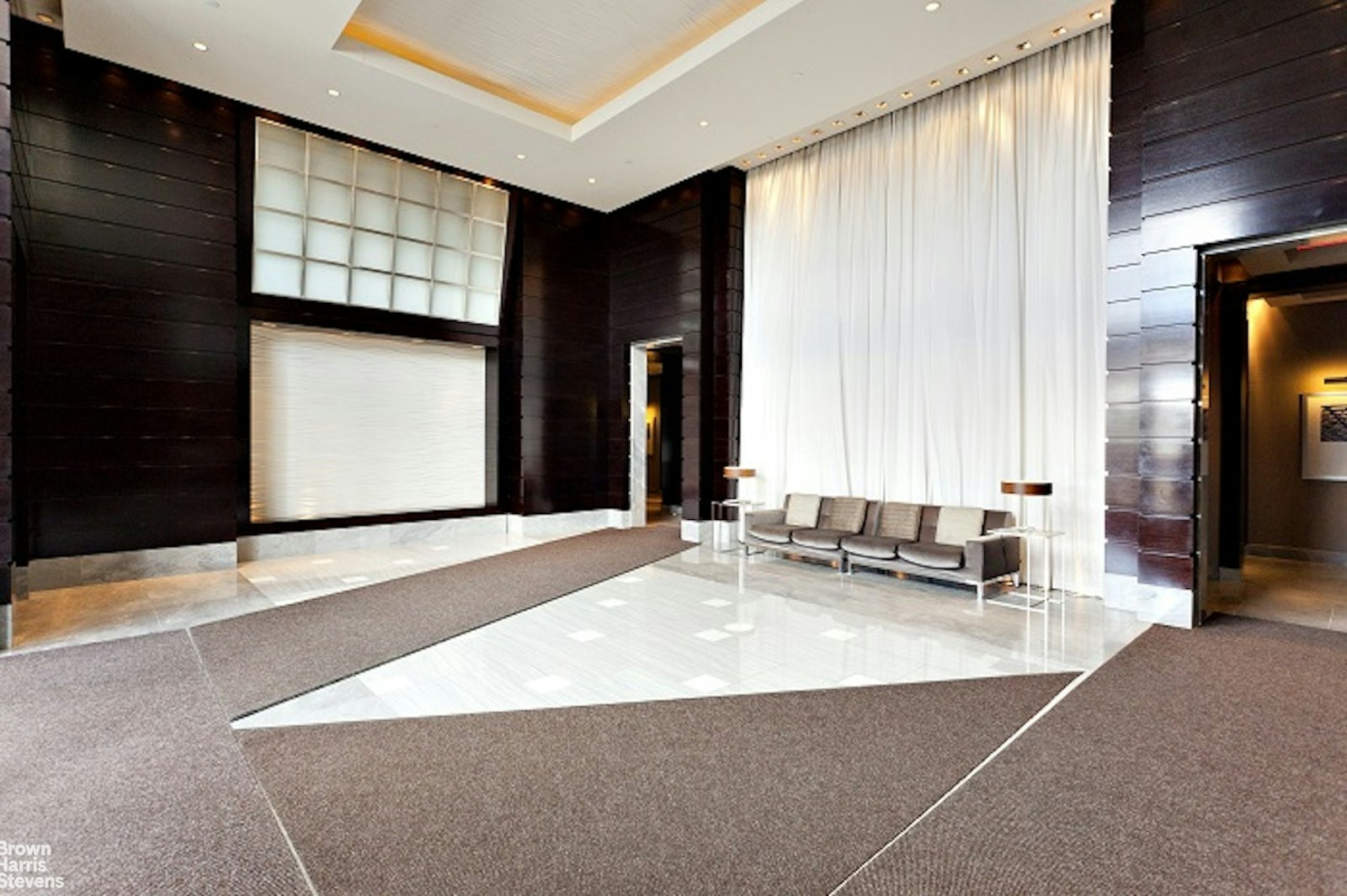 100 Riverside Boulevard, Unit 27A Manhattan, NY 10069 - Photo 43 of 48 a view of a living room with a large window