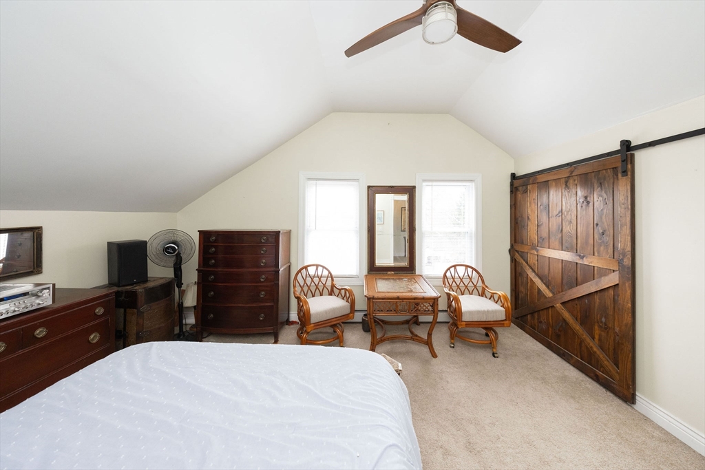 129 School Street Warren, MA 01083 - Photo 17 of 41 a bedroom with furniture and a flat screen tv