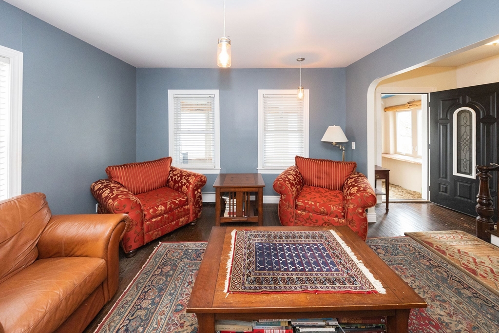 129 School Street Warren, MA 01083 - Photo 33 of 41 a living room with furniture rug and window