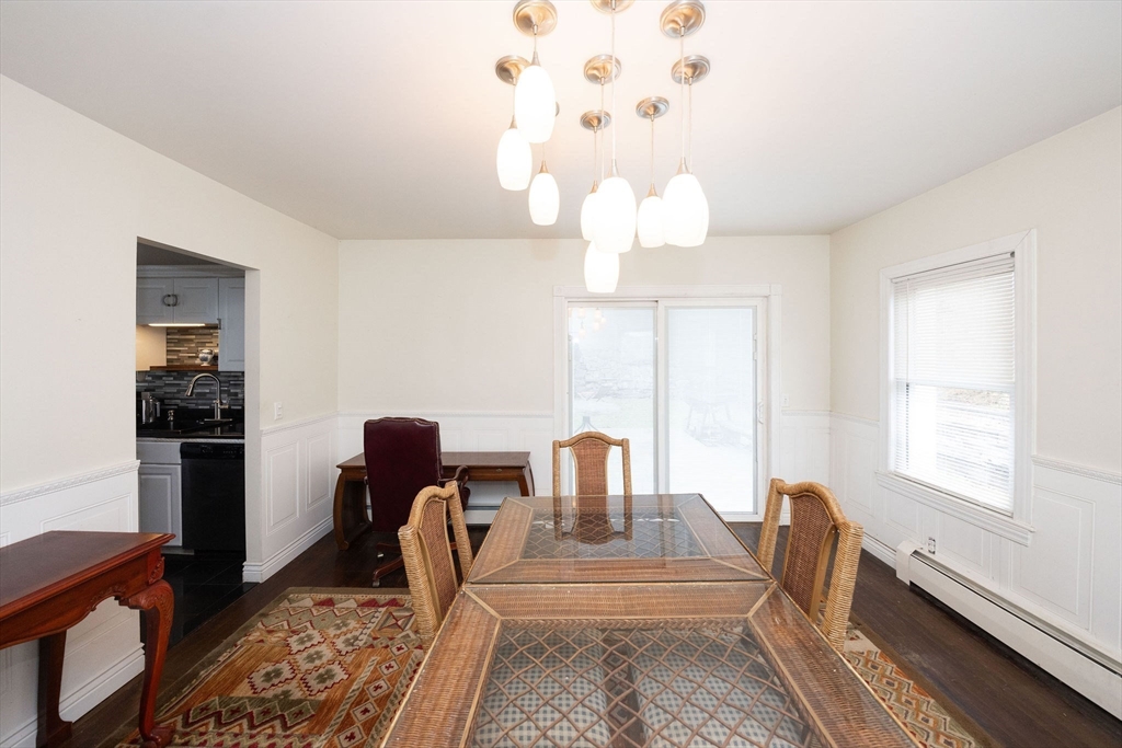 129 School Street Warren, MA 01083 - Photo 38 of 41 a living room with furniture chandelier and a window