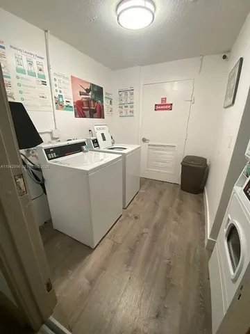 a view of kitchen with washer and dryer