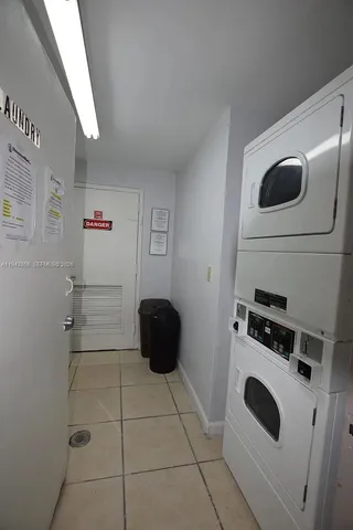 a kitchen with a stove and a refrigerator