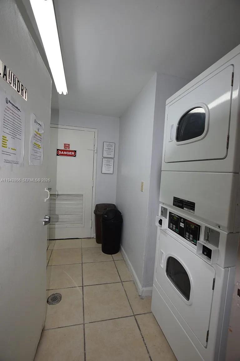 501 Southwest 6th Court, Unit 327 Miami, FL 33130 - Photo 13 of 20 a kitchen with a stove and a refrigerator