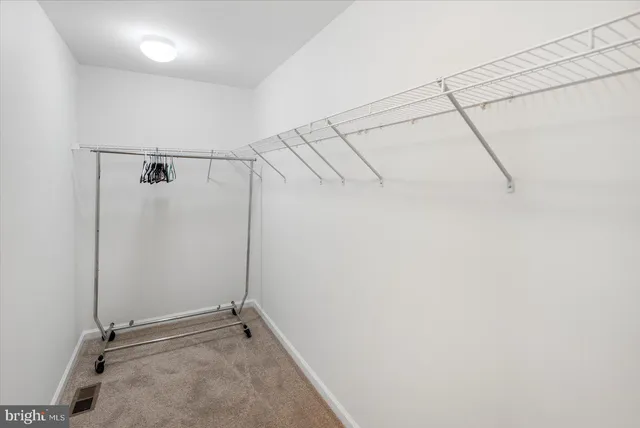 a view of a room with racks on the wall