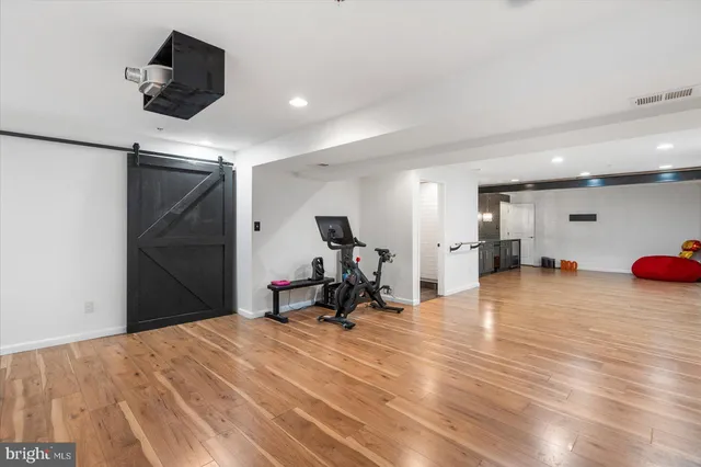 a room with furniture and wooden floor