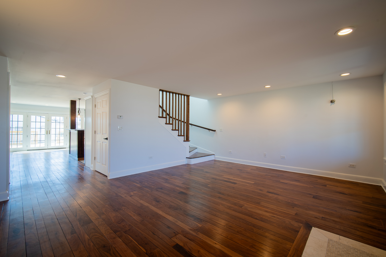 4137 Clinton Avenue Stickney, IL 60402 - Photo 14 of 41 a view of empty room with wooden floor and window