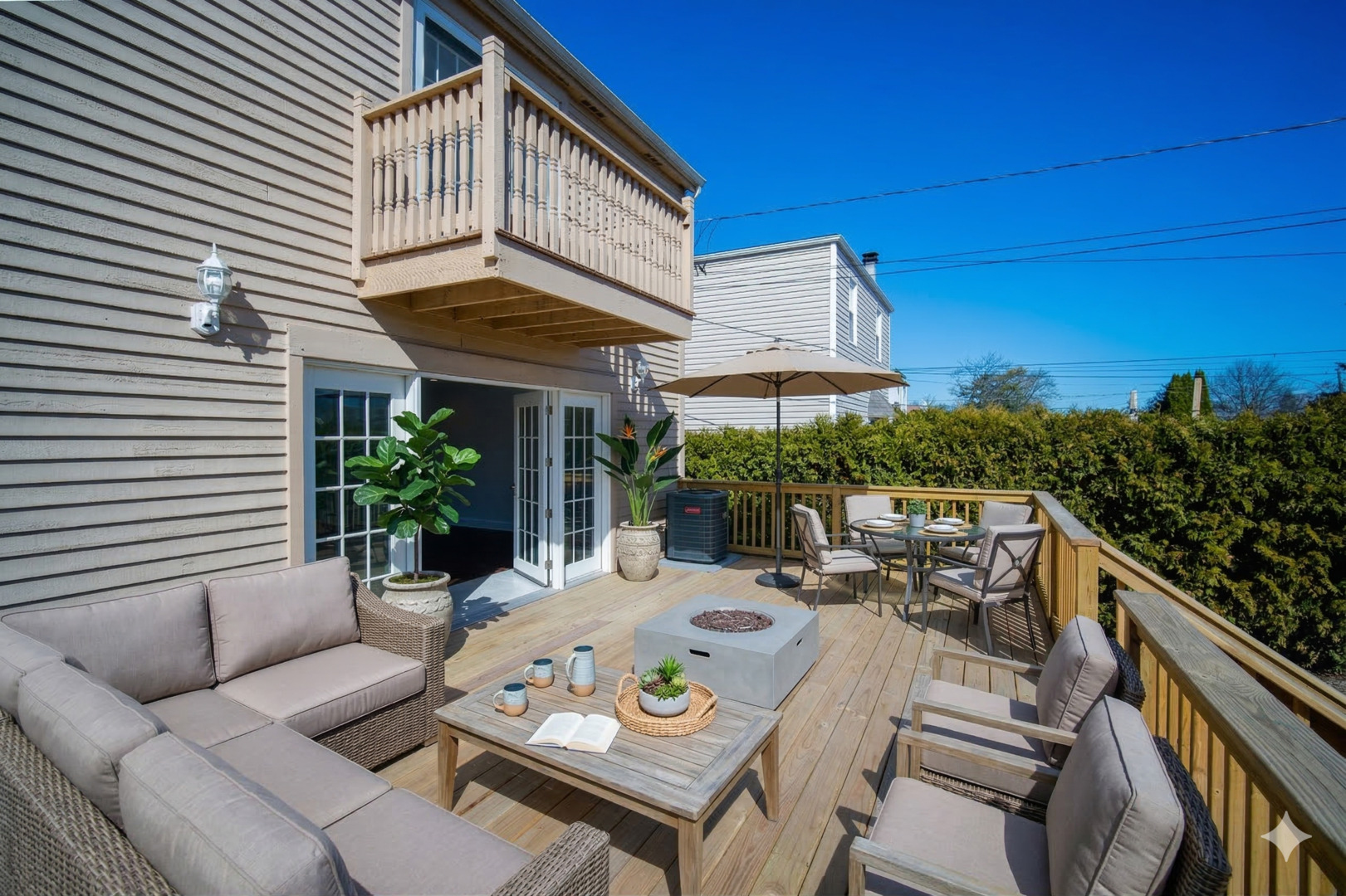 4137 Clinton Avenue Stickney, IL 60402 - Photo 17 of 41 a view of a patio with couches table and chairs and potted plants