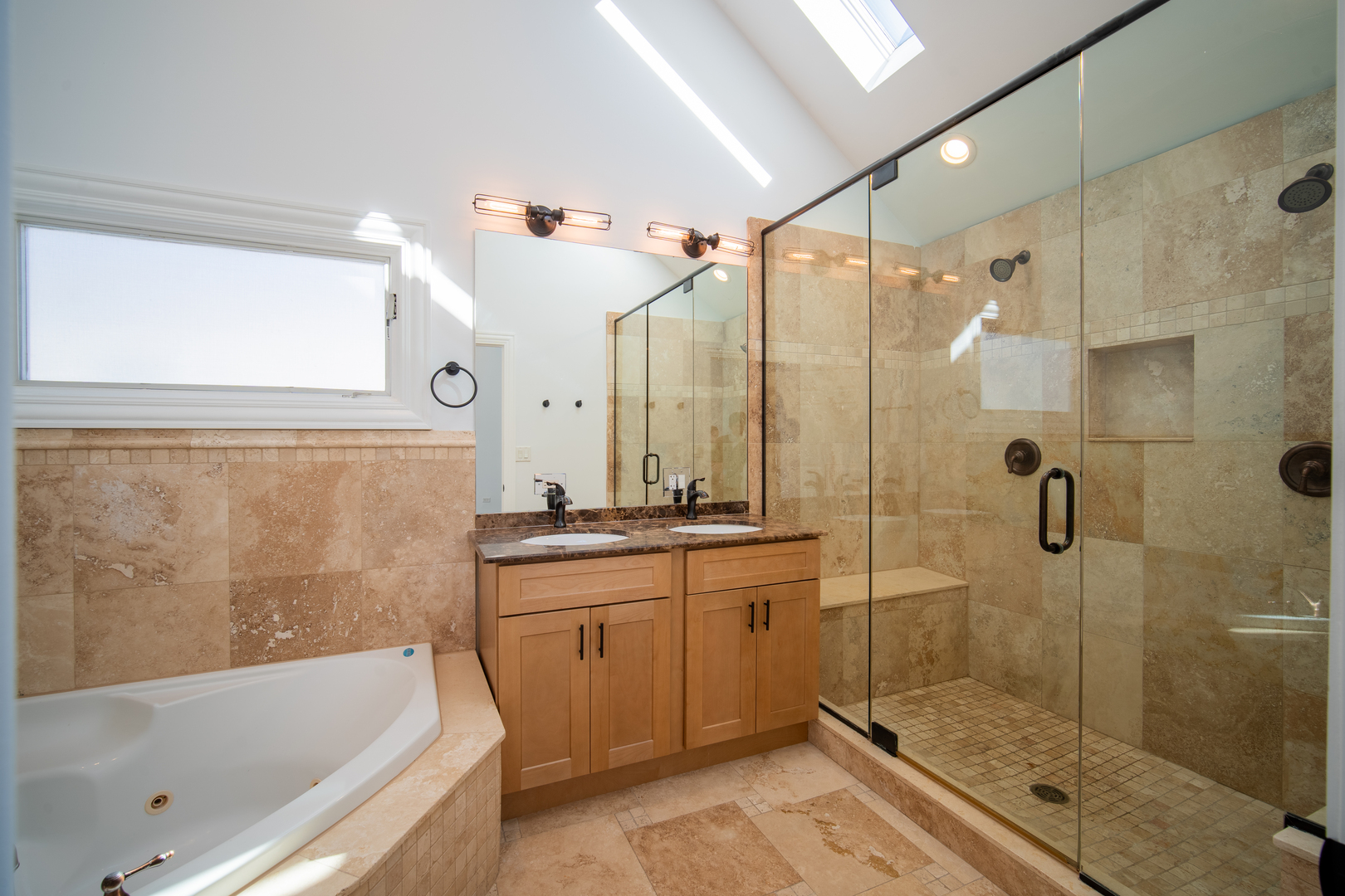 4137 Clinton Avenue Stickney, IL 60402 - Photo 25 of 41 a bathroom with a granite countertop bathtub shower sink mirror and toilet