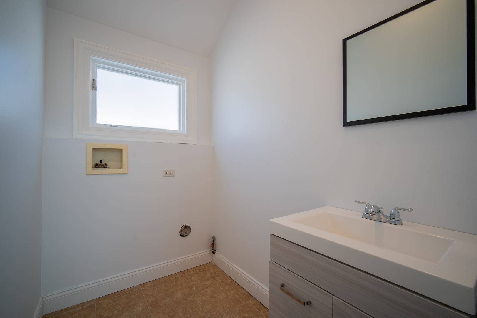 4137 Clinton Avenue Stickney, IL 60402 - Photo 36 of 41 a bathroom with a sink toilet and mirror