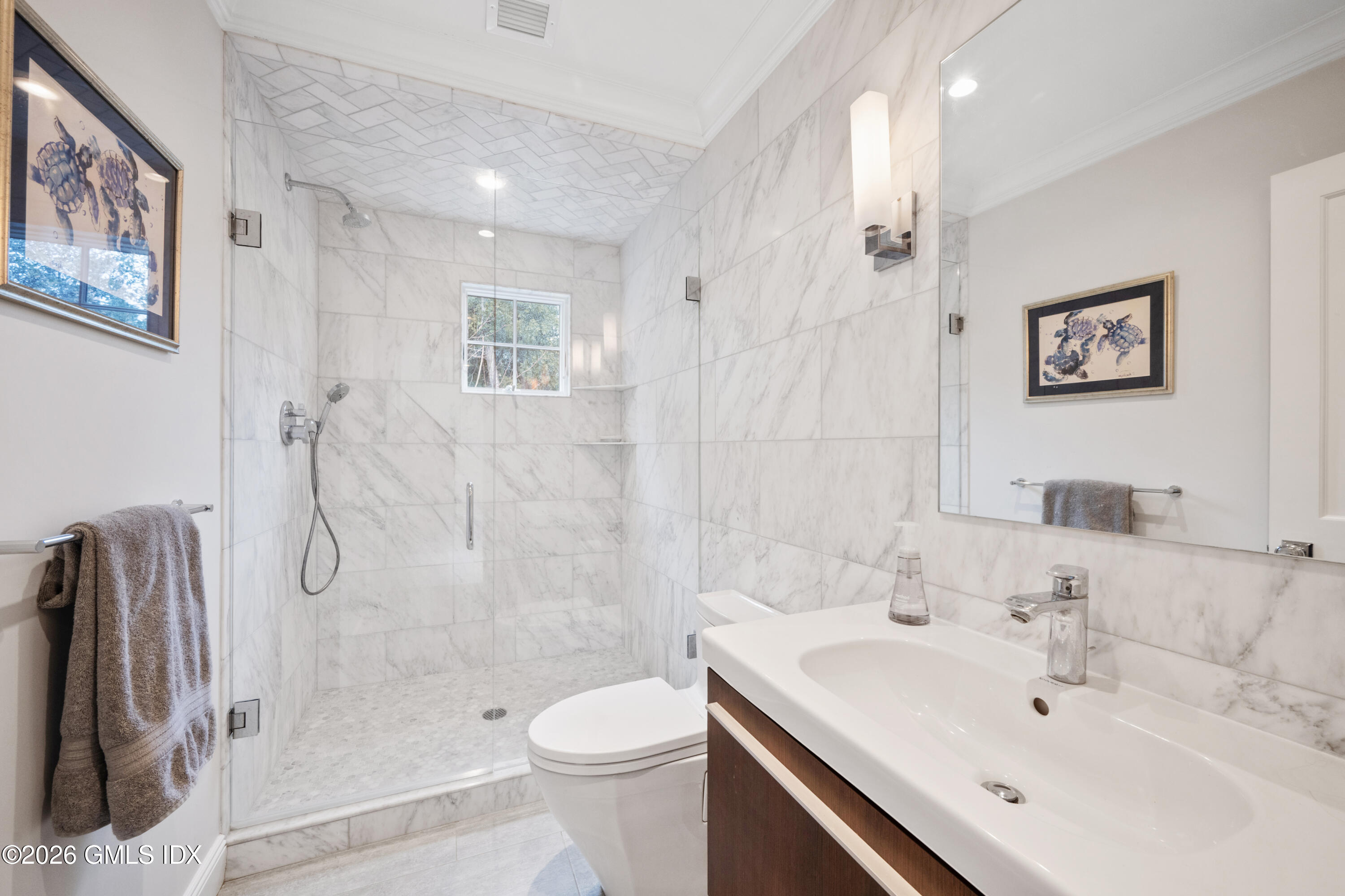 15 Pell Place Riverside, CT 06878 - Photo 25 of 35 a bathroom with a sink toilet and shower
