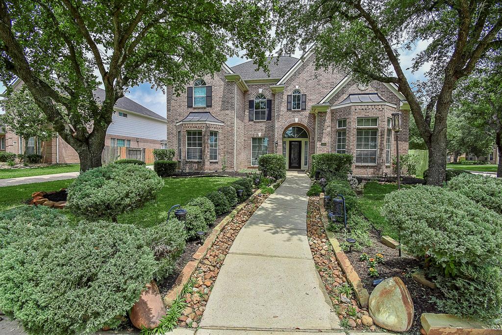 This amazing home may look like a fairy tale palace, but every nook and cranny (inside and out) are designed for real royal enjoyment! This single family, 2-story, palatial brick jewel is located at 22602 Lauren Meadow Lane, Katy, TX, in a charming cul-de-sac, while also boasting a gorgeous water view!