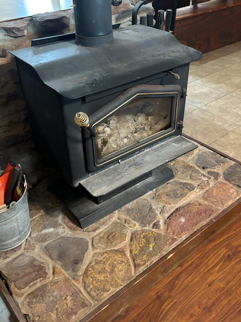 349 New Hope Road Mauk, GA 31058 - Photo 28 of 48 wood burning stove in great room
