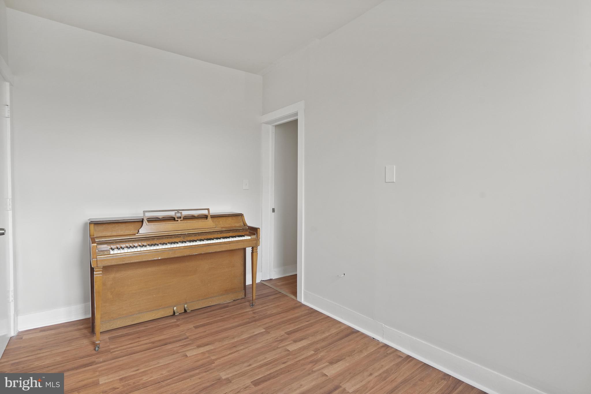 7 18th Street Southeast, Unit 208 Washington, DC 20003 - Photo 18 of 21 a view of a room with wooden floor