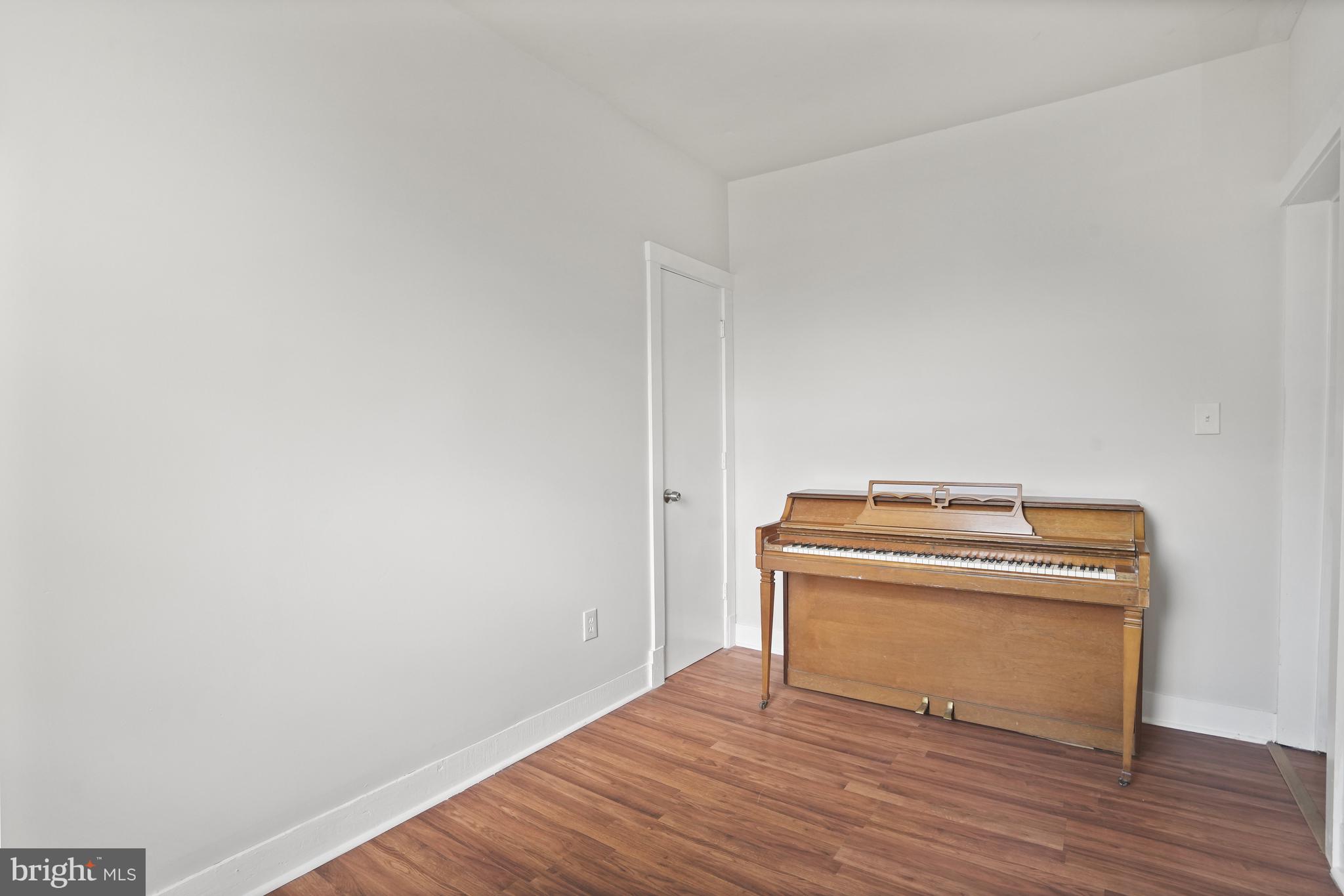 7 18th Street Southeast, Unit 208 Washington, DC 20003 - Photo 19 of 21 a view of a room with wooden floor