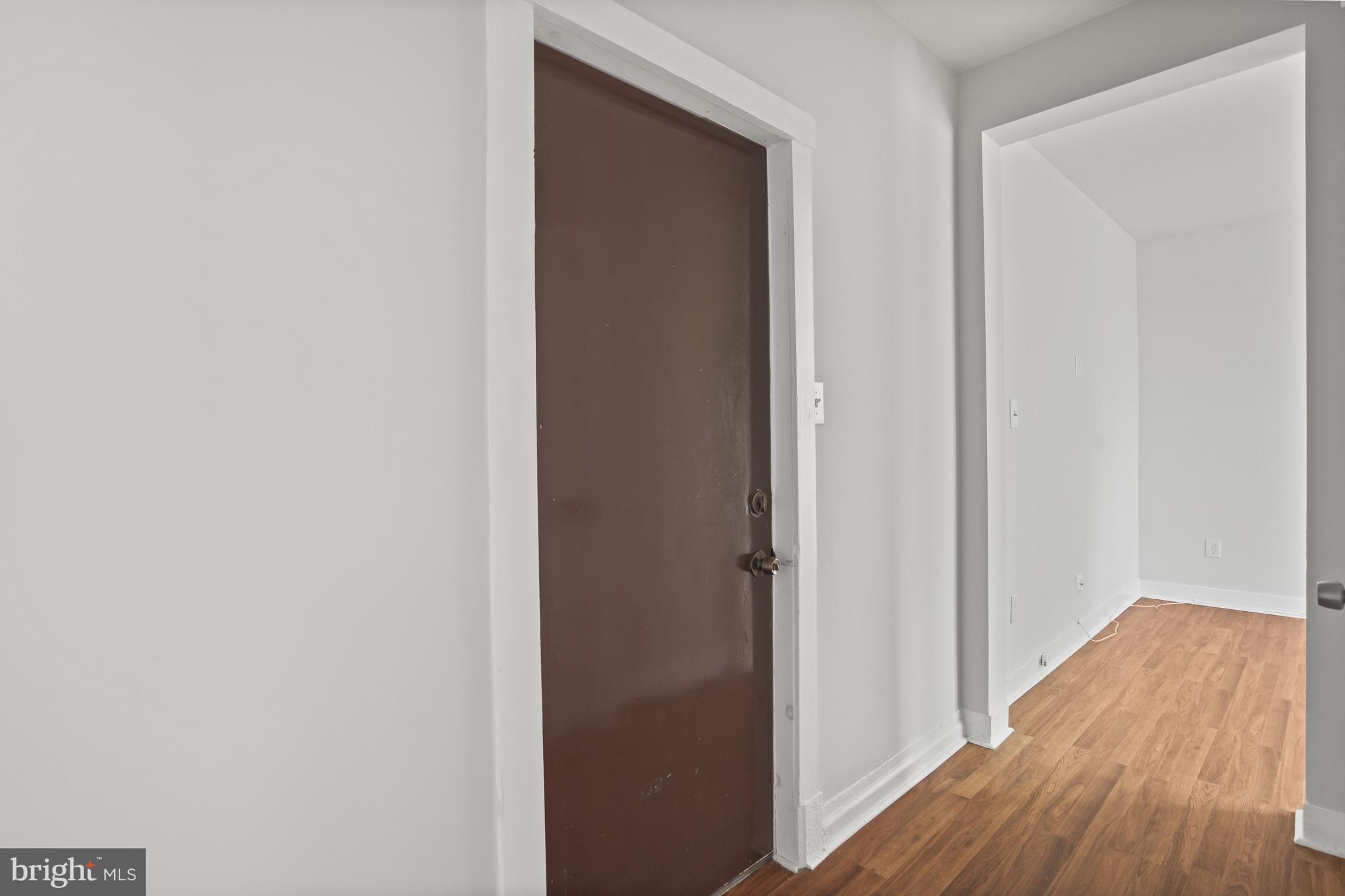 7 18th Street Southeast, Unit 208 Washington, DC 20003 - Photo 2 of 21 a view of a hallway with wooden floor
