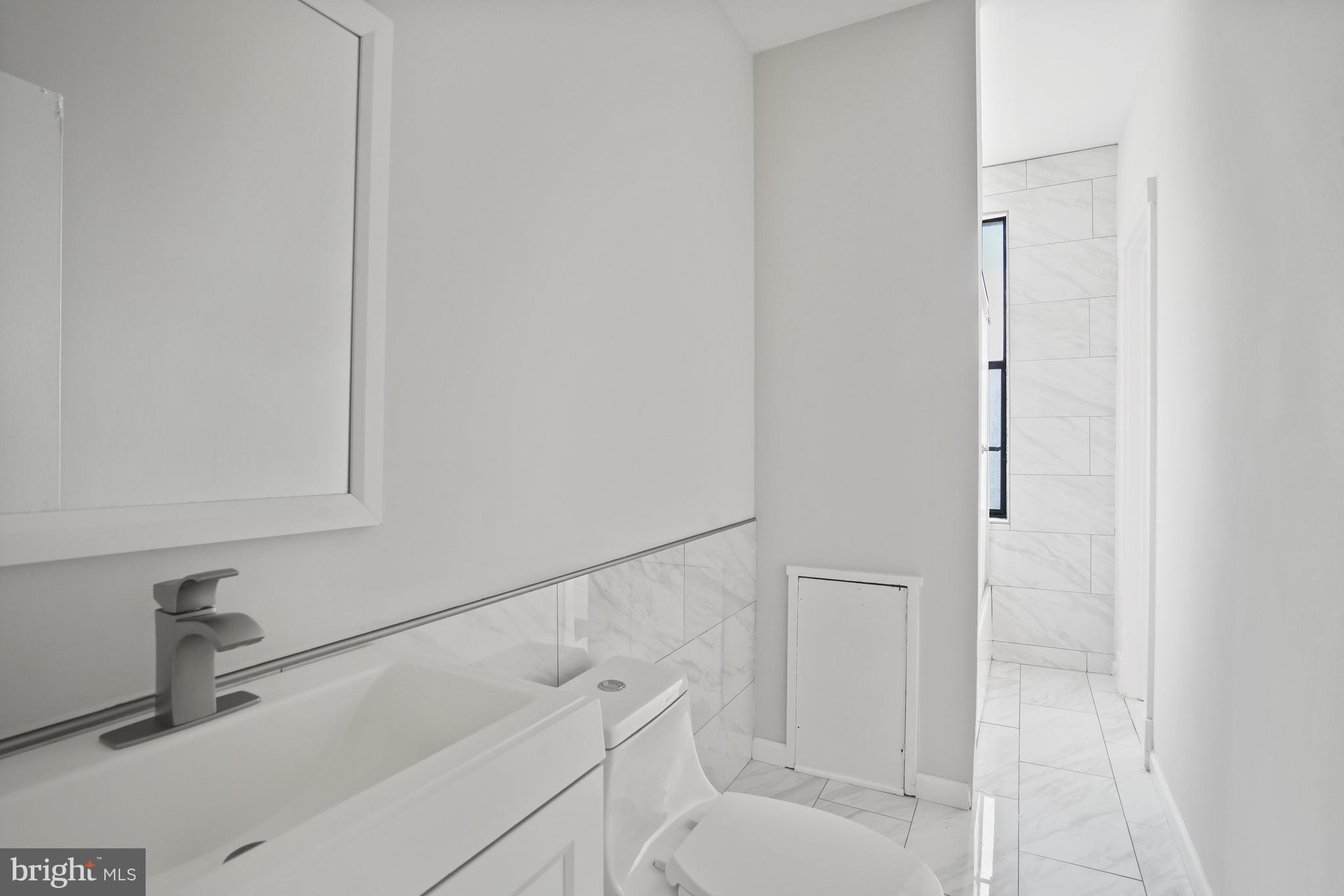 7 18th Street Southeast, Unit 208 Washington, DC 20003 - Photo 10 of 21 a bathroom with a bathtub and shower