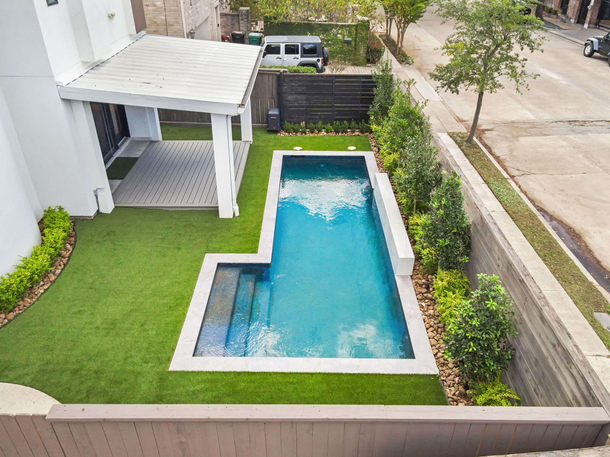 6011 Burgoyne Road, Unit A Houston, TX 77057 - Photo 45 of 46 Brand new turf, pool & covered patio trex decking