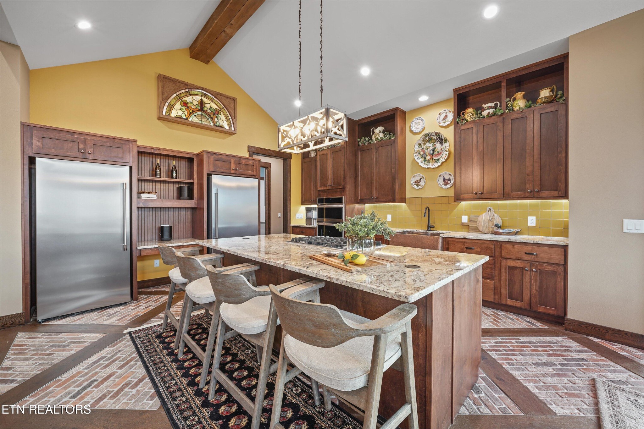 1150 Hillendale Road Crossville, TN 38572 - Photo 17 of 42 a kitchen with a table and chairs in it