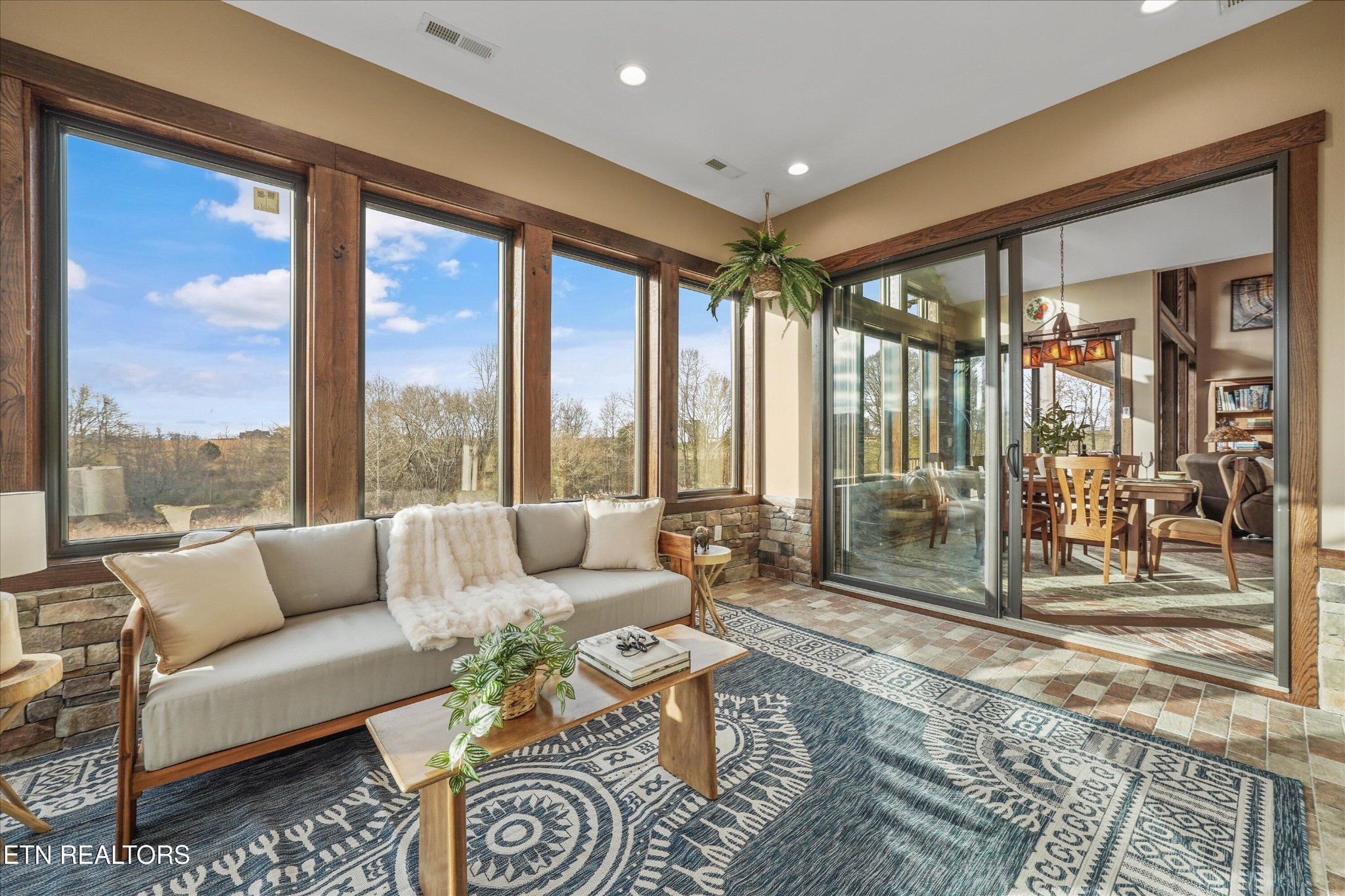 1150 Hillendale Road Crossville, TN 38572 - Photo 20 of 42 a living room with furniture and a floor to ceiling window