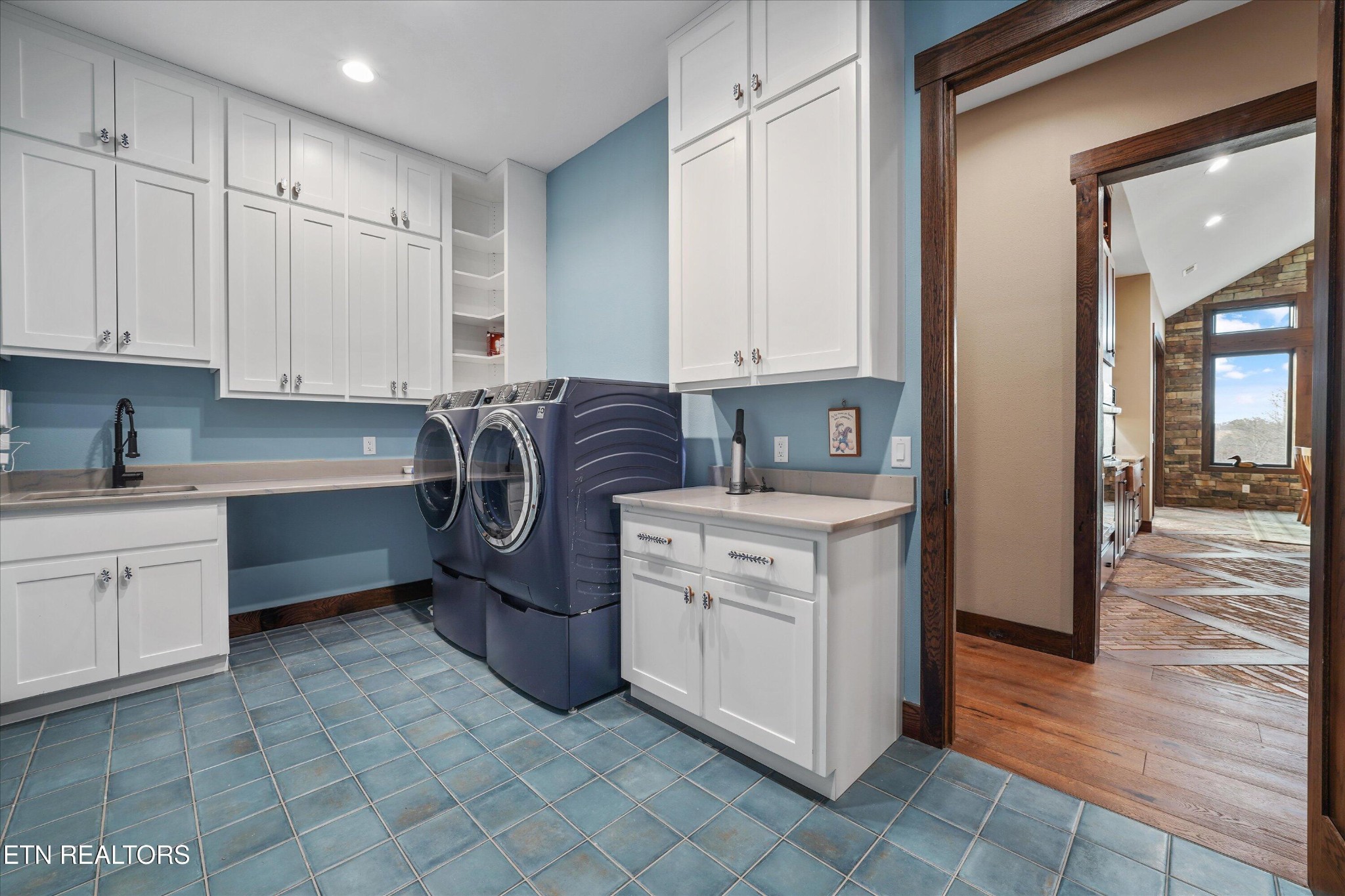 1150 Hillendale Road Crossville, TN 38572 - Photo 21 of 42 a kitchen with white cabinets and white appliances