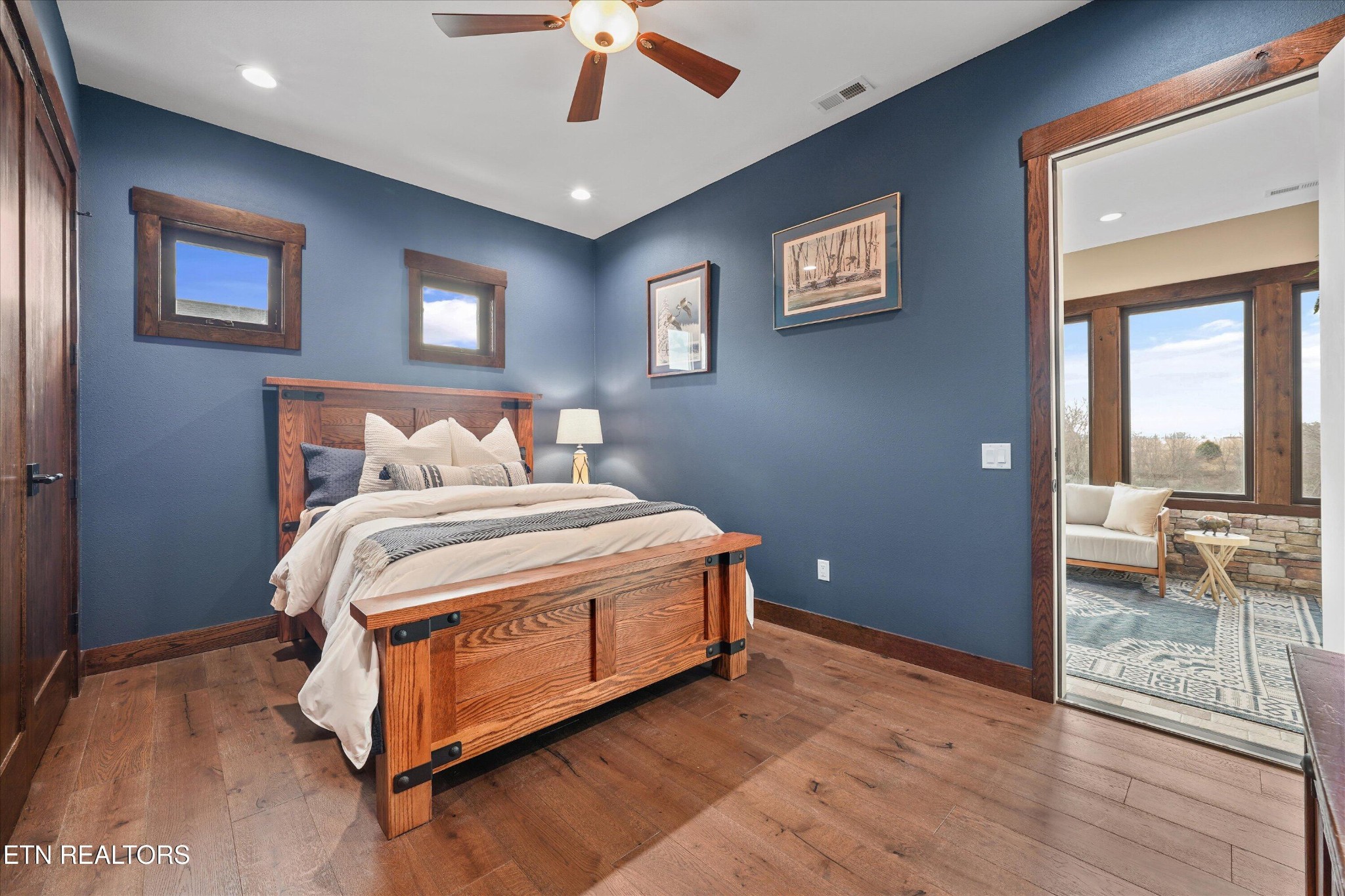 1150 Hillendale Road Crossville, TN 38572 - Photo 23 of 42 a bedroom with a bed and glass door