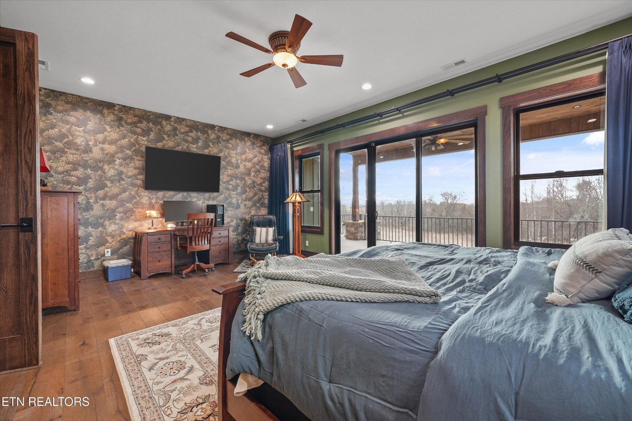 1150 Hillendale Road Crossville, TN 38572 - Photo 25 of 42 a bed sitting in a spacious bedroom next to a window