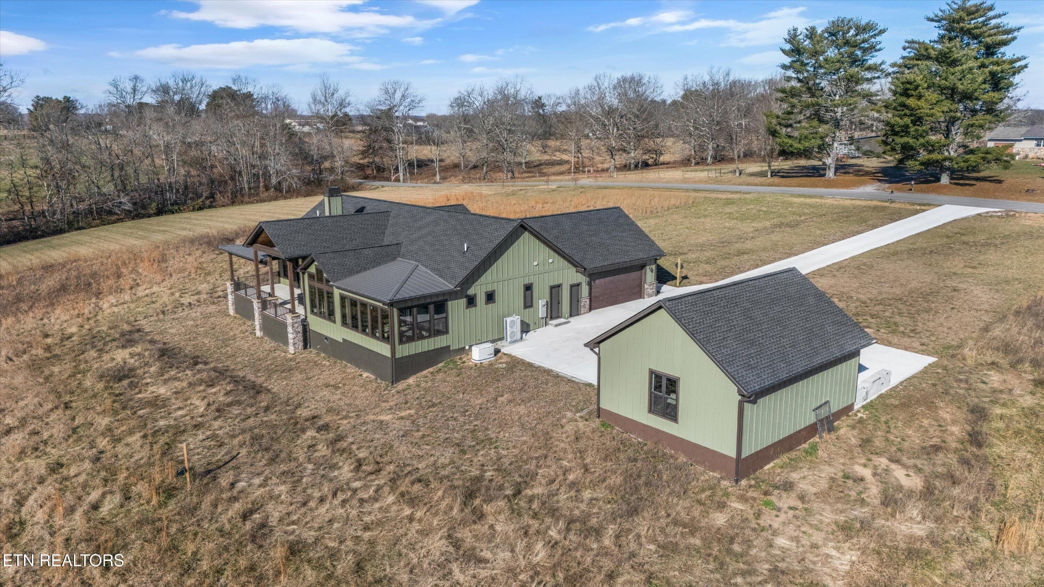 1150 Hillendale Road Crossville, TN 38572 - Photo 37 of 42 a view of a house with a yard and large trees