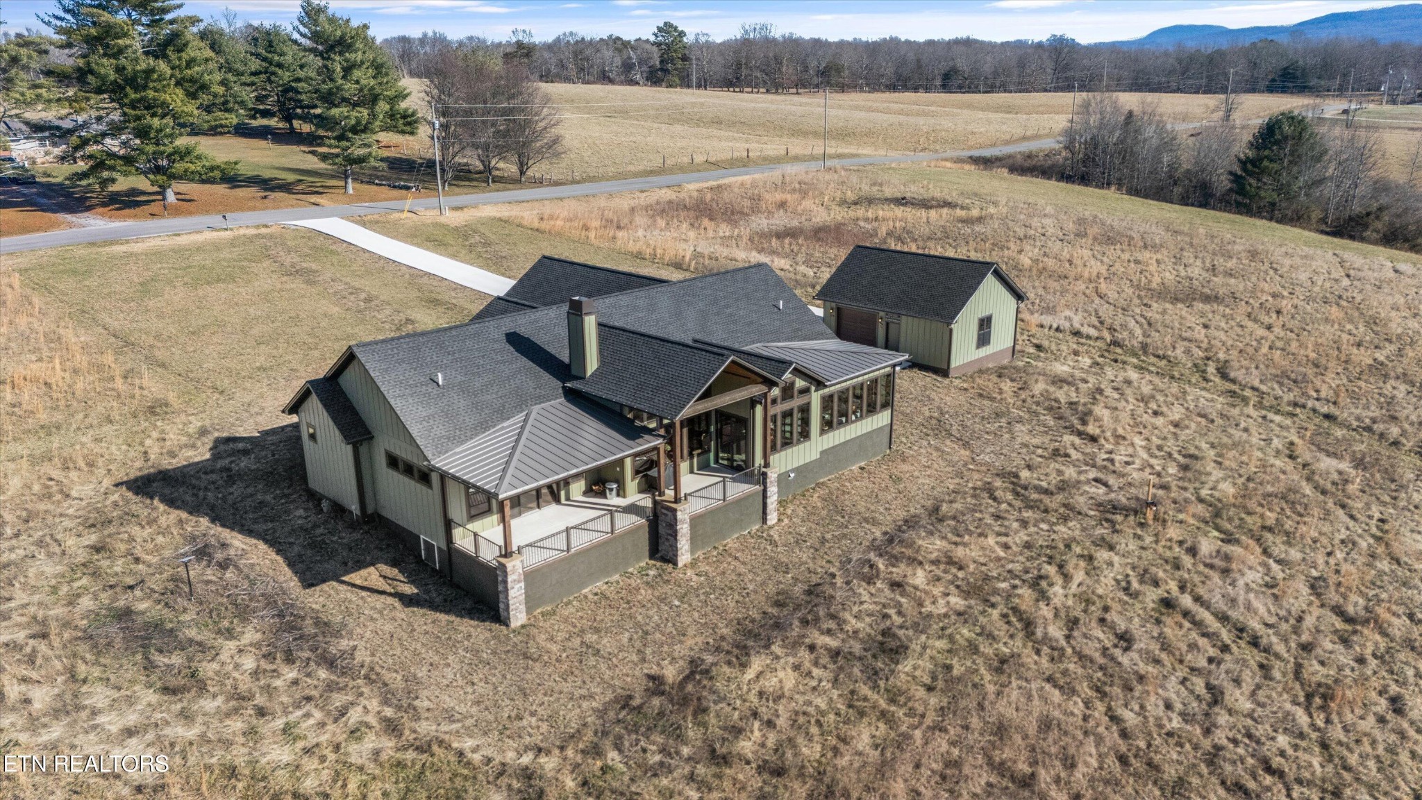 1150 Hillendale Road Crossville, TN 38572 - Photo 38 of 42 an aerial view of a house with yard and lake view