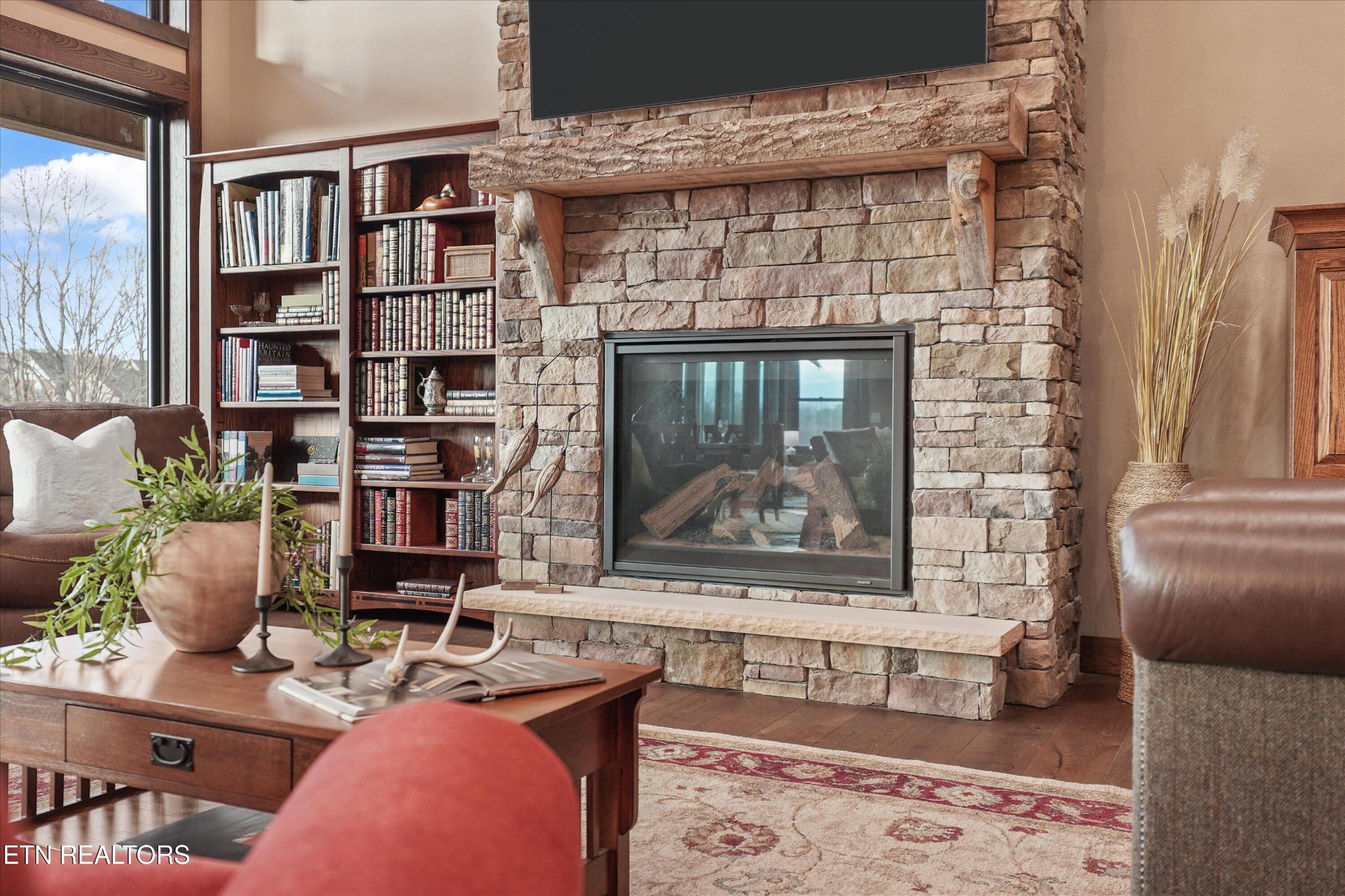 1150 Hillendale Road Crossville, TN 38572 - Photo 8 of 42 a living room with furniture and a fireplace