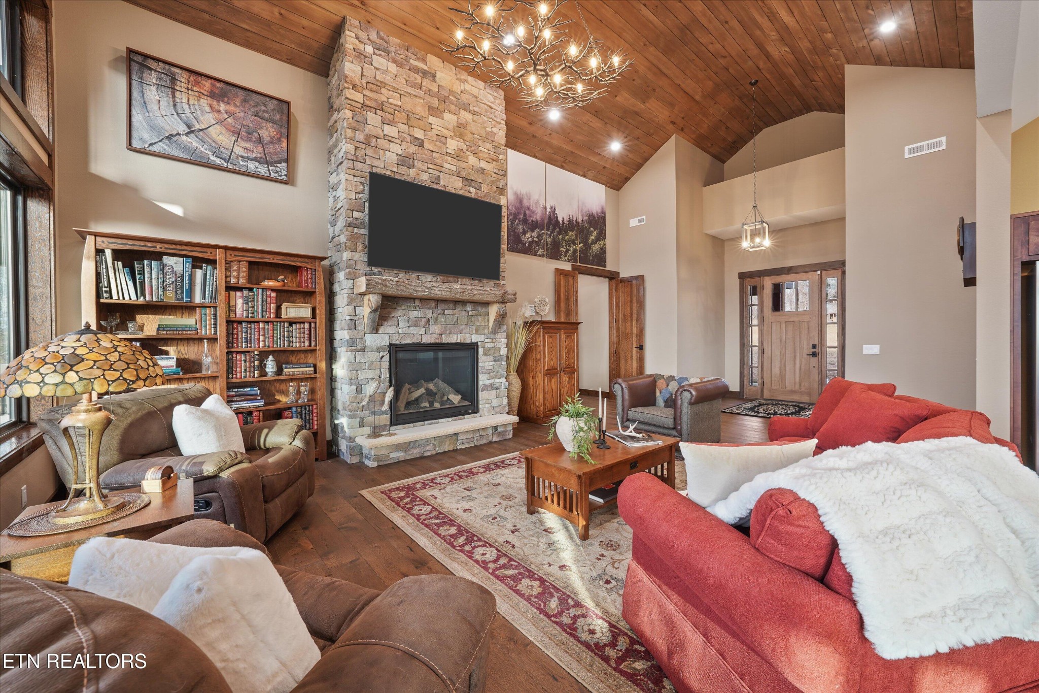 1150 Hillendale Road Crossville, TN 38572 - Photo 9 of 42 a living room with furniture a flat screen tv and a fireplace