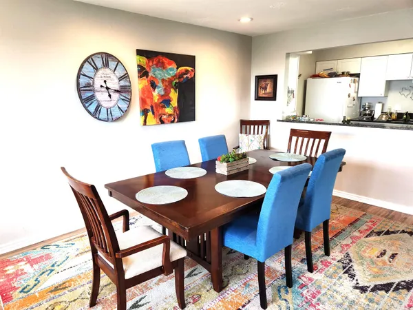 a view of a dining room with furniture