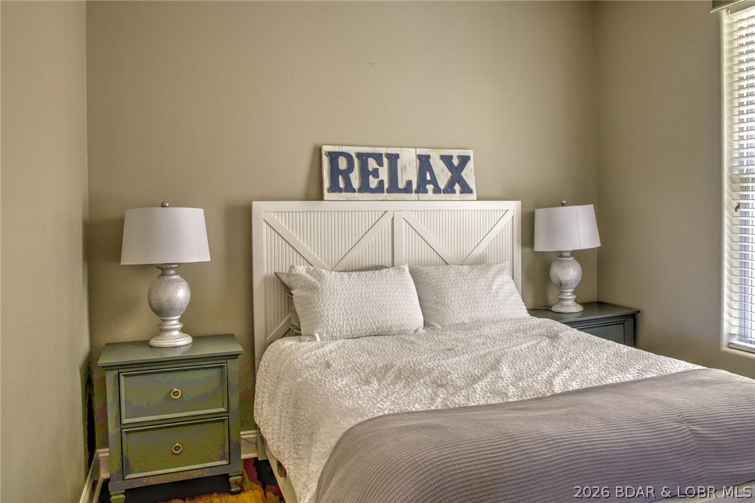 275 Flynn Road, Unit 106 Lake Ozark, MO 65049 - Photo 12 of 39 Main level guest Bedroom.