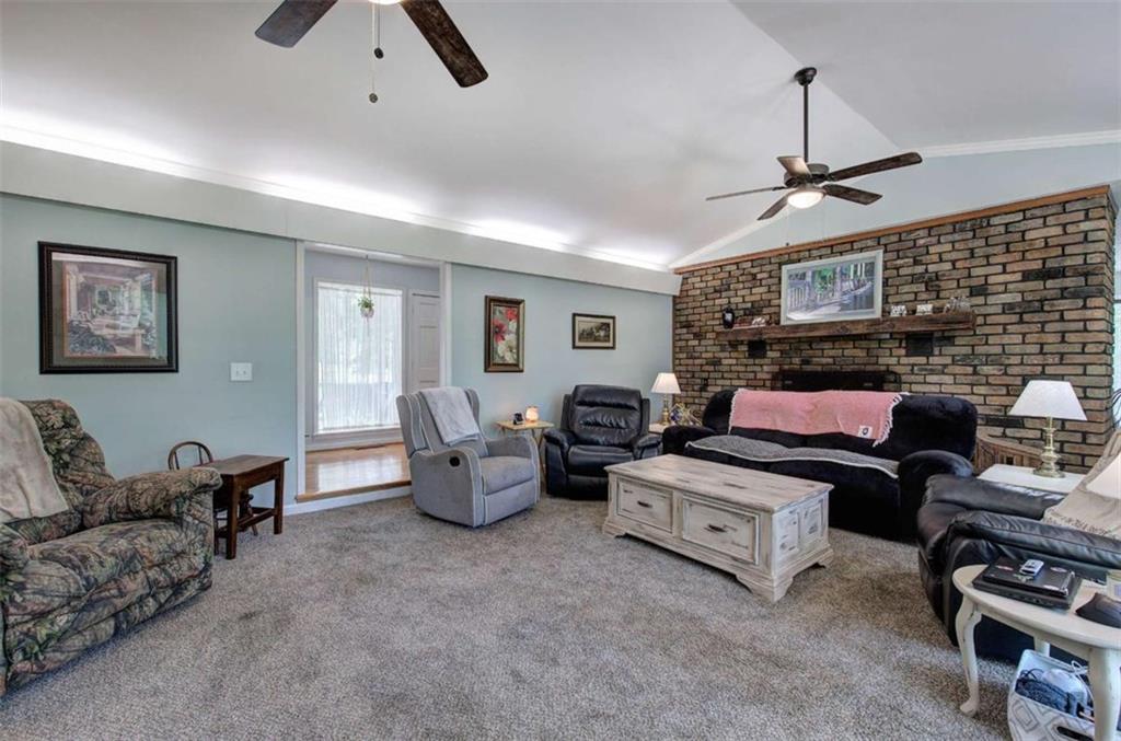 567 Fred Kelly Road Northeast Rome, GA 30161 - Photo 15 of 59 a living room with furniture