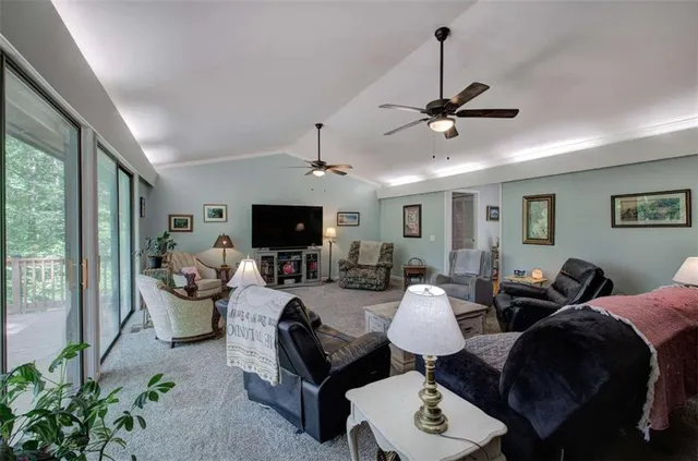 a view of workspace with furniture and window